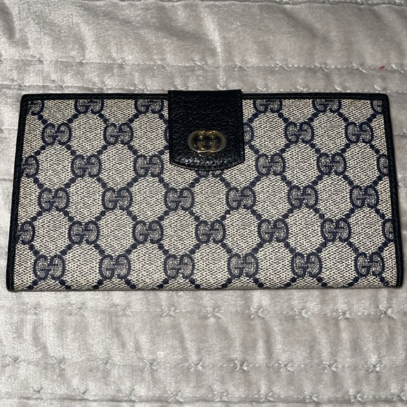 Gucci Handbags - Authentic preloved Gucci wallet excellent condition navy blue.